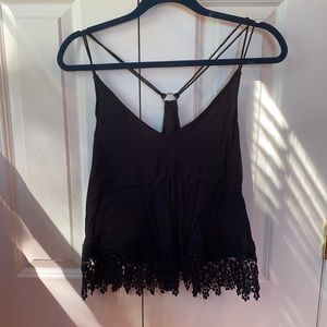 Black flowy racerback tank with lace bottom